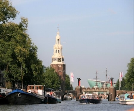 Amsterdam canal with boats — sailing routes and tips
