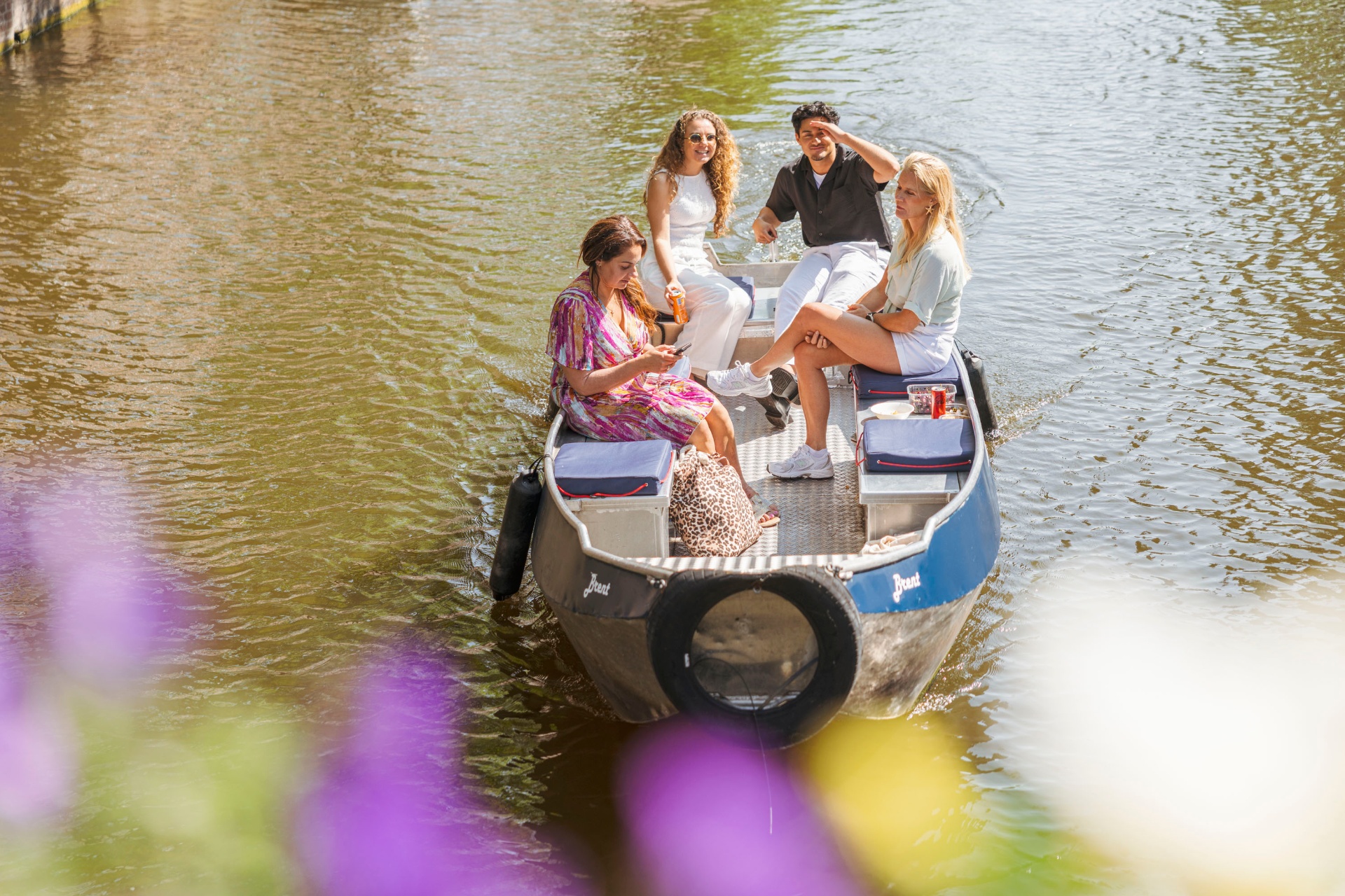 Friends enjoying boat rental Amsterdam - fun group outing Boats4rent